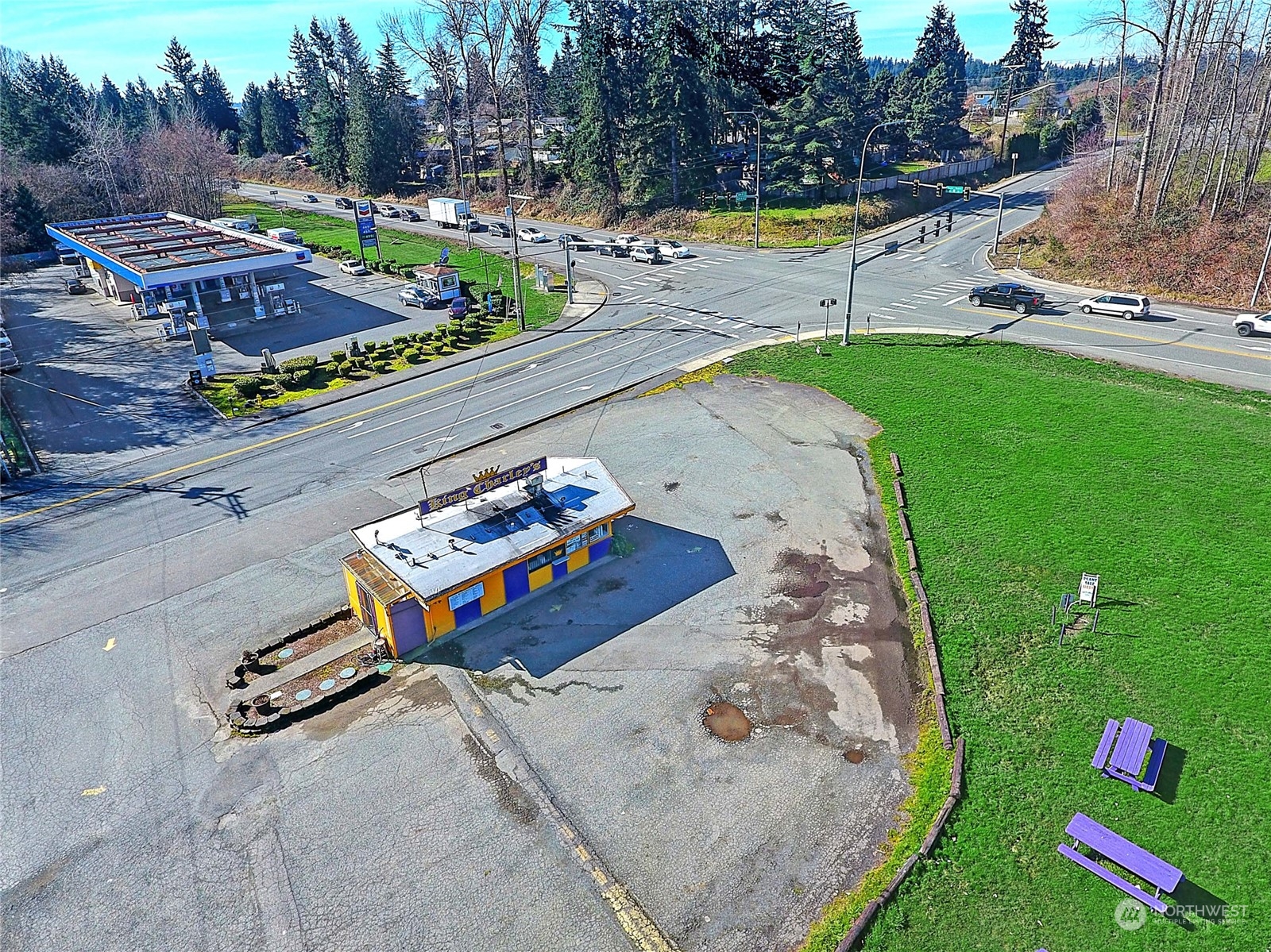 an aerial view of a house with outdoor space