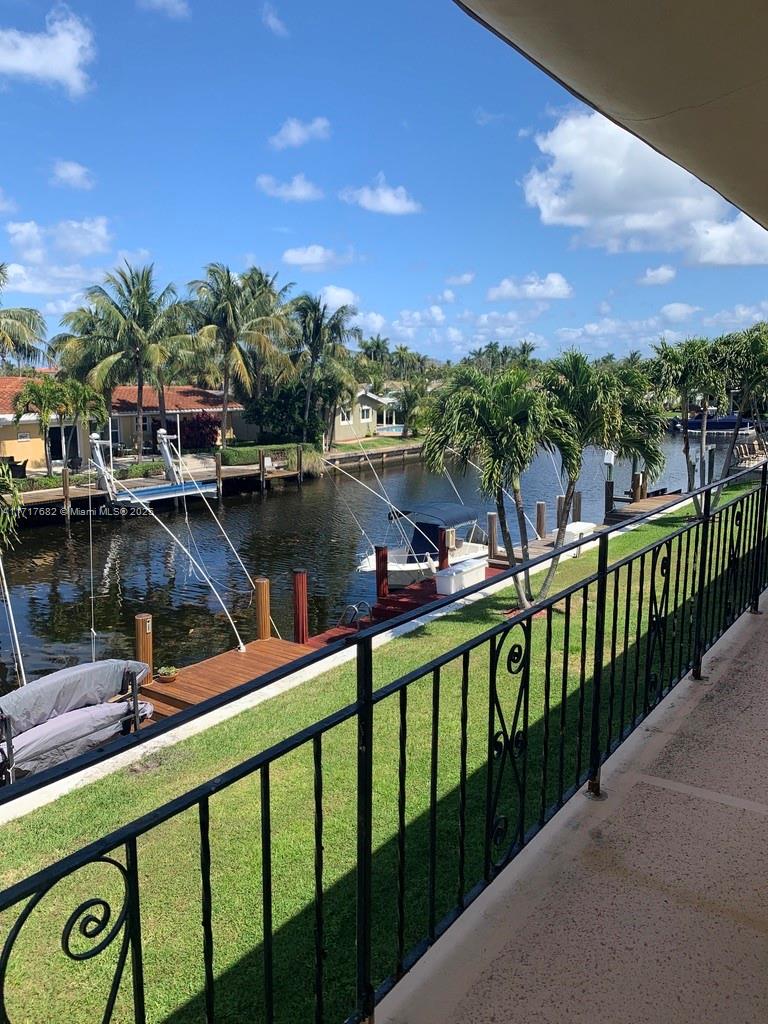 a view of a lake from a balcony