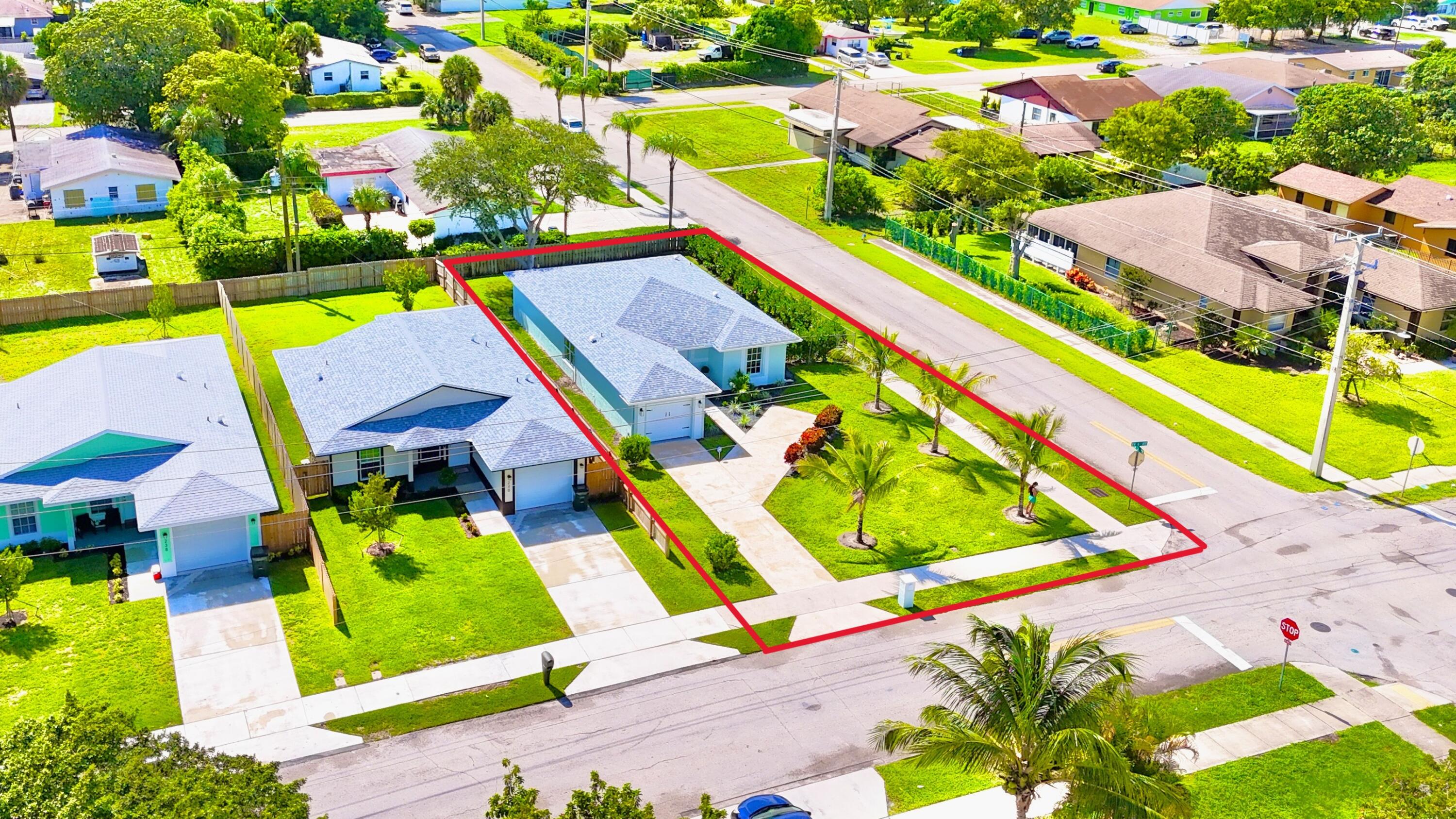 an aerial view of a pool patio swimming pool and outdoor seating