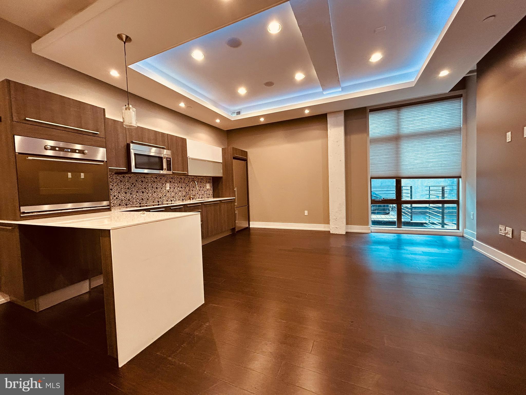 a view of a kitchen with a sink