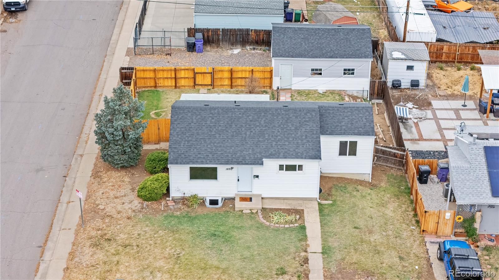 a aerial view of a house with swimming pool