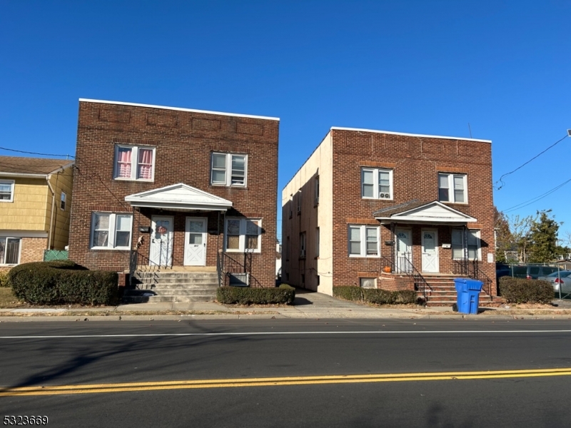 a front view of a building with street view