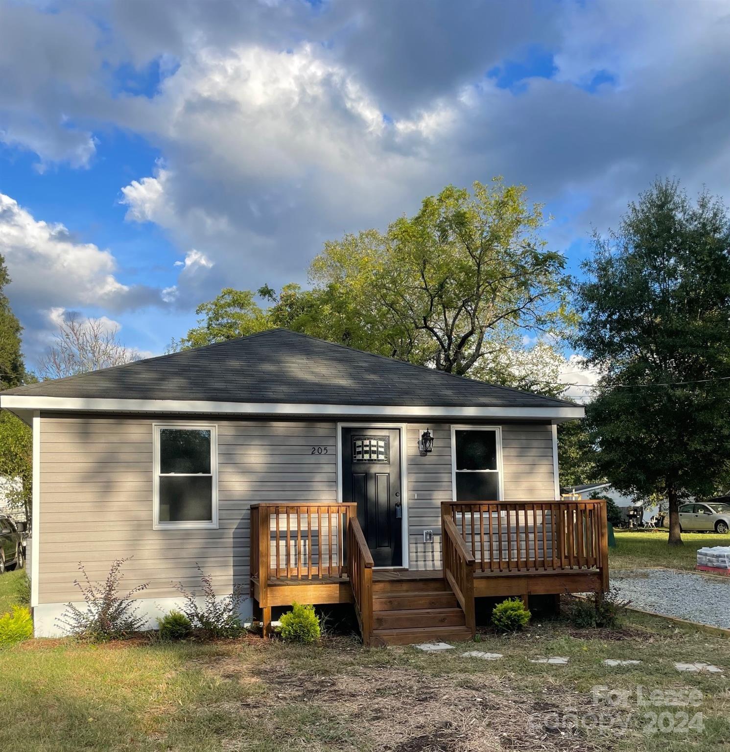 front view of a house with a yard