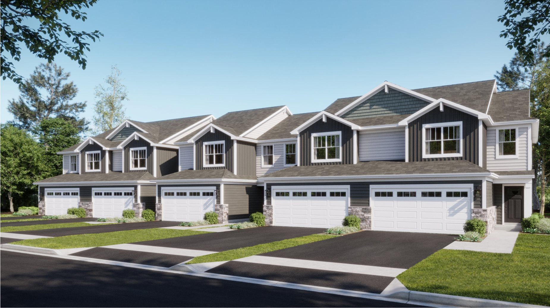 a front view of a residential houses with yard and road