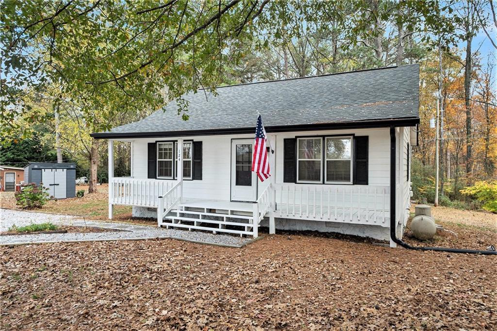 a house with trees in the background