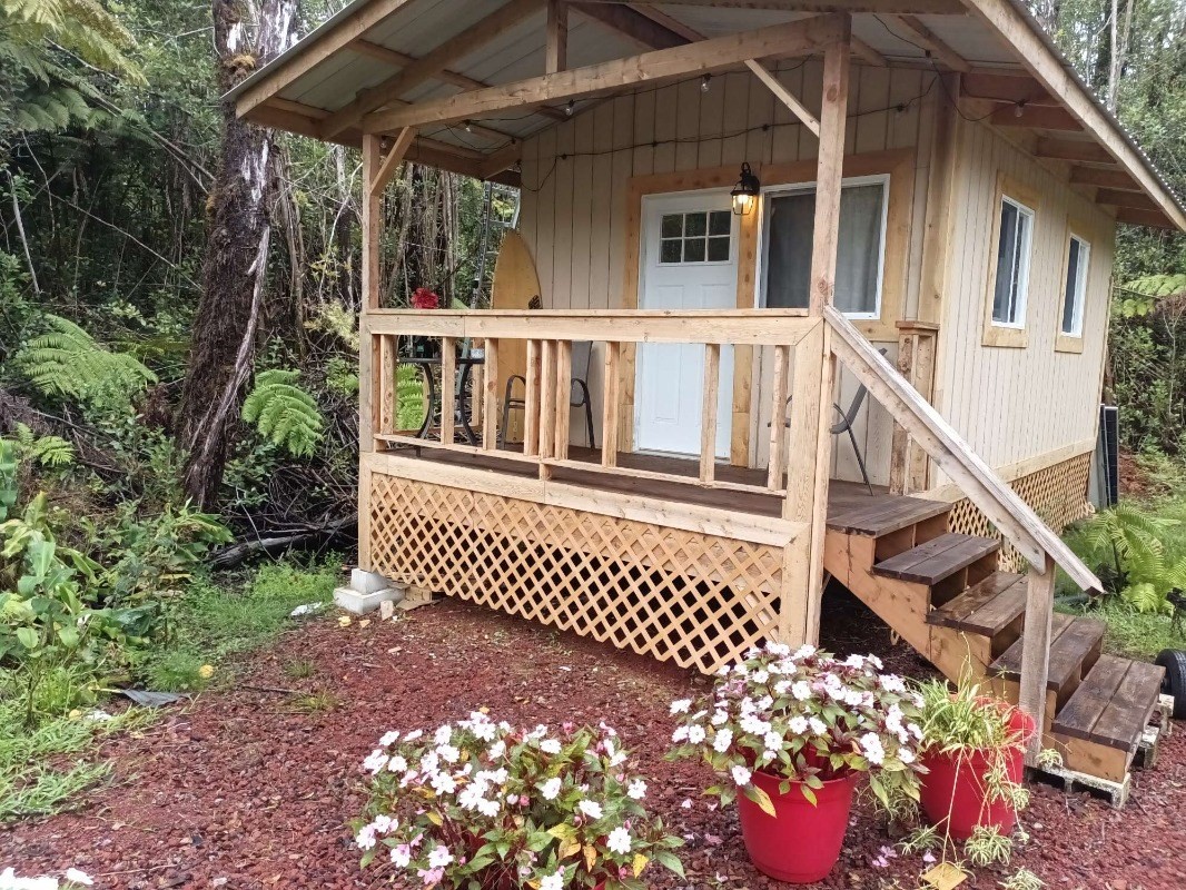 a view of a house with a small yard