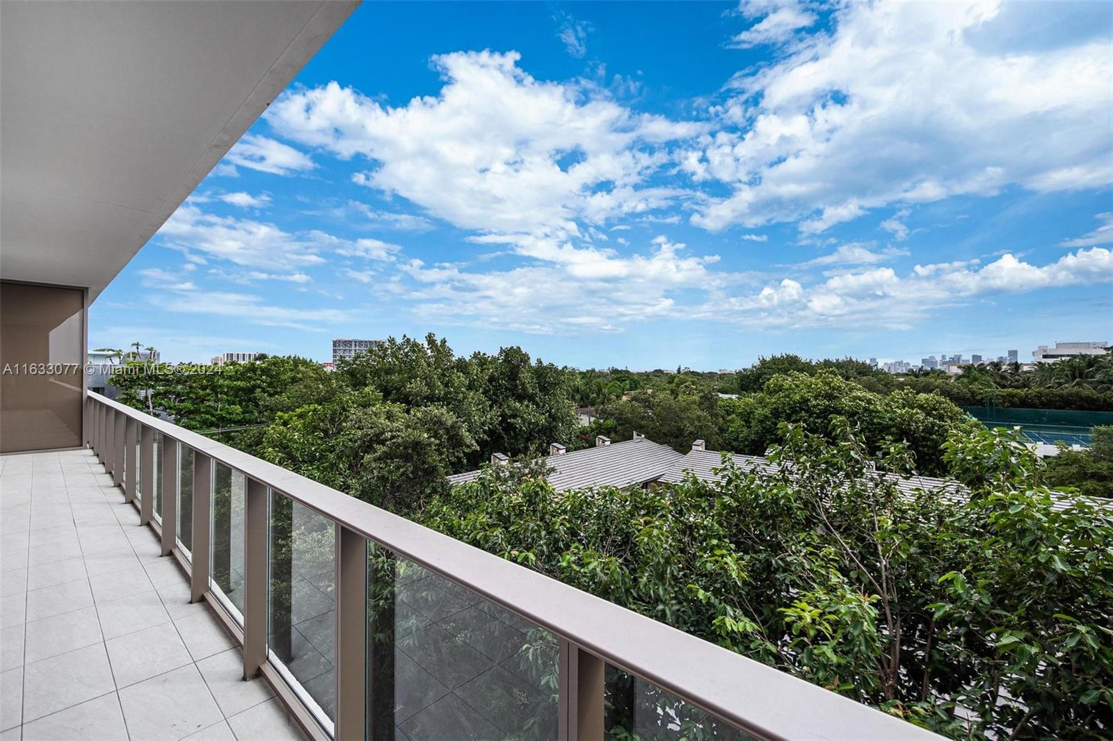 a view of a balcony with an outdoor space