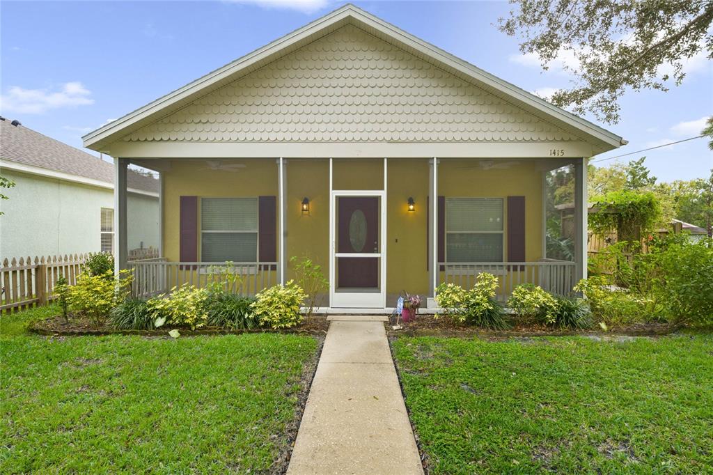 front view of a house with a yard