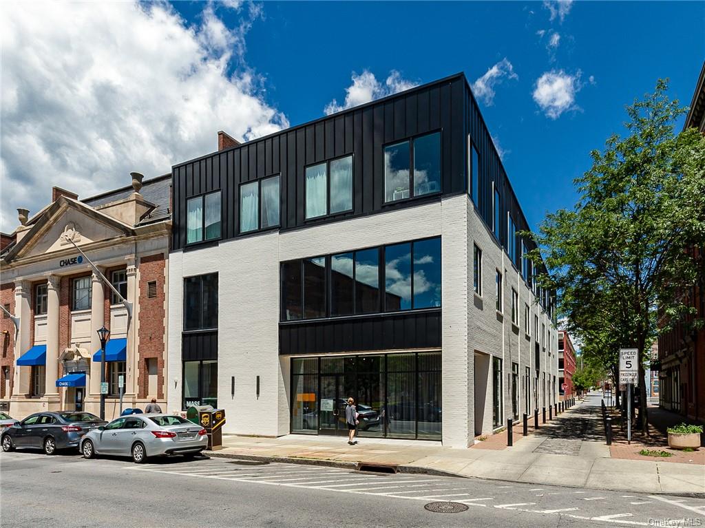 a front view of a building with street view