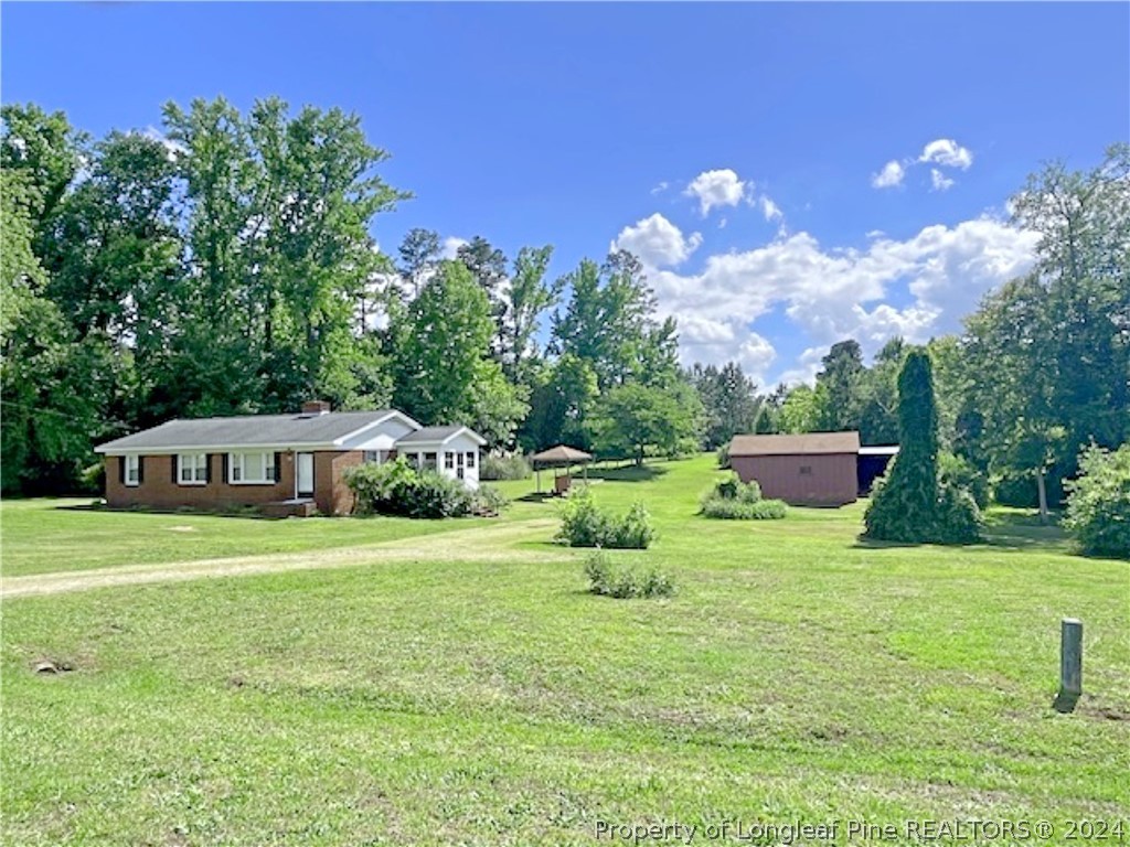 a house view with a garden space