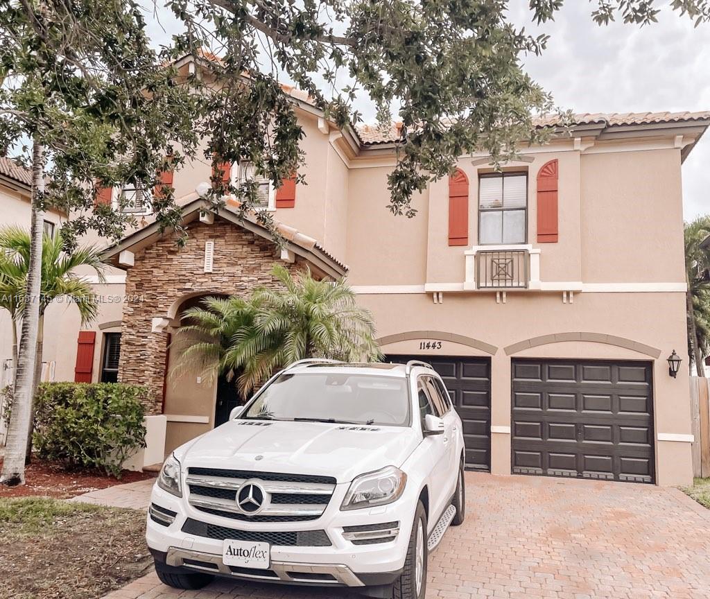 a car parked in front of house