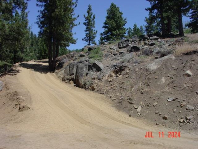 a view of road with trees