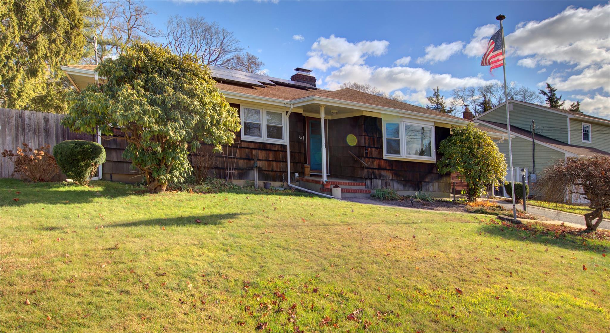 a front view of house with yard