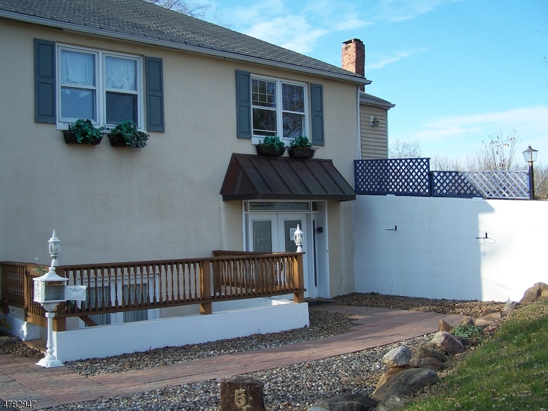 a front view of a house with a balcony