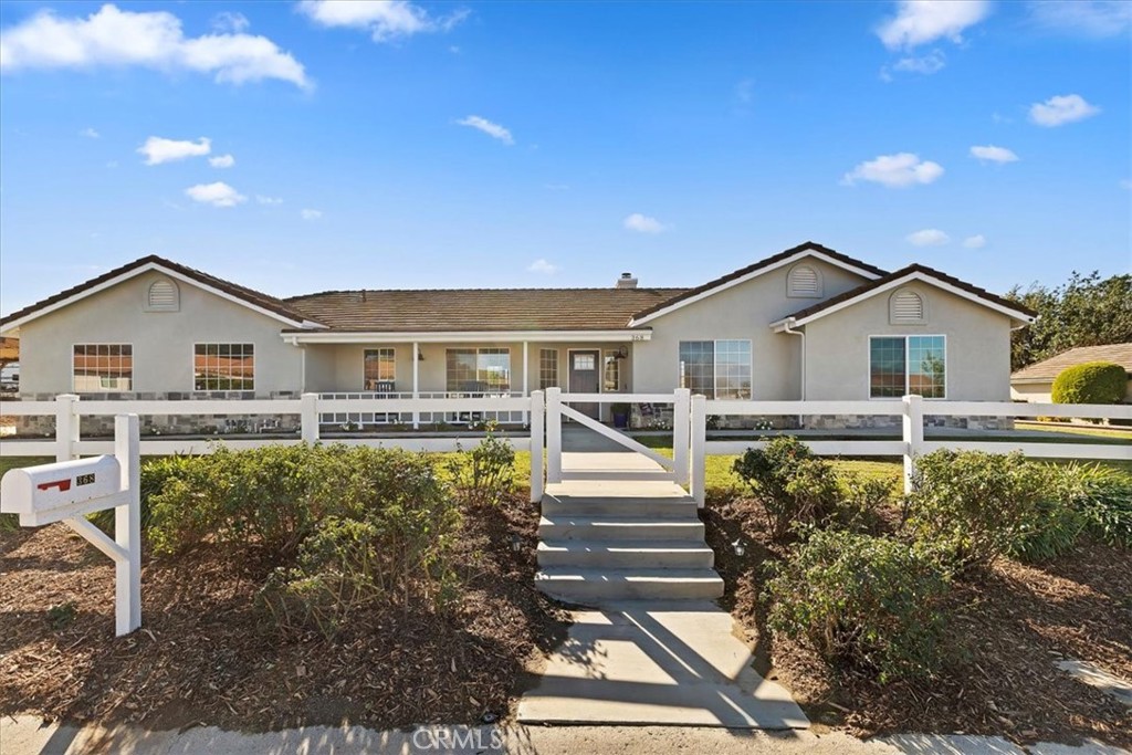 a view of house with outdoor space