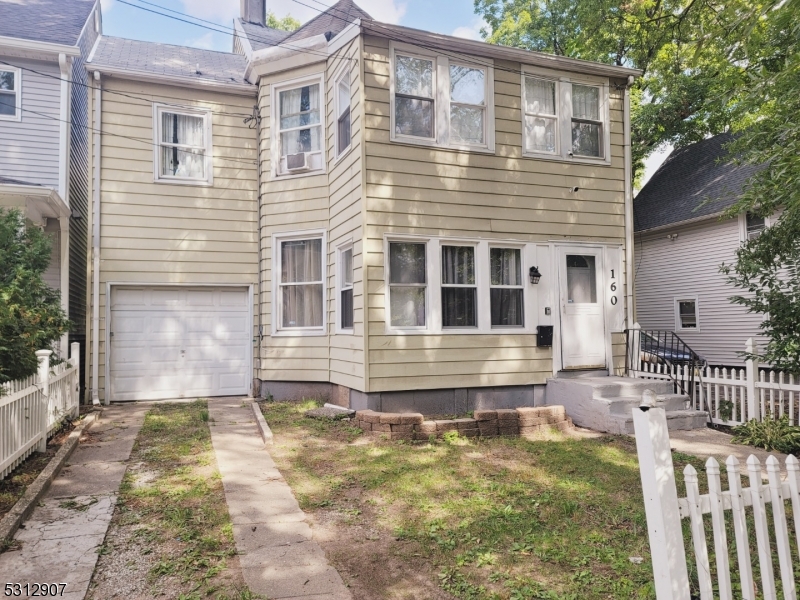 a front view of house with yard