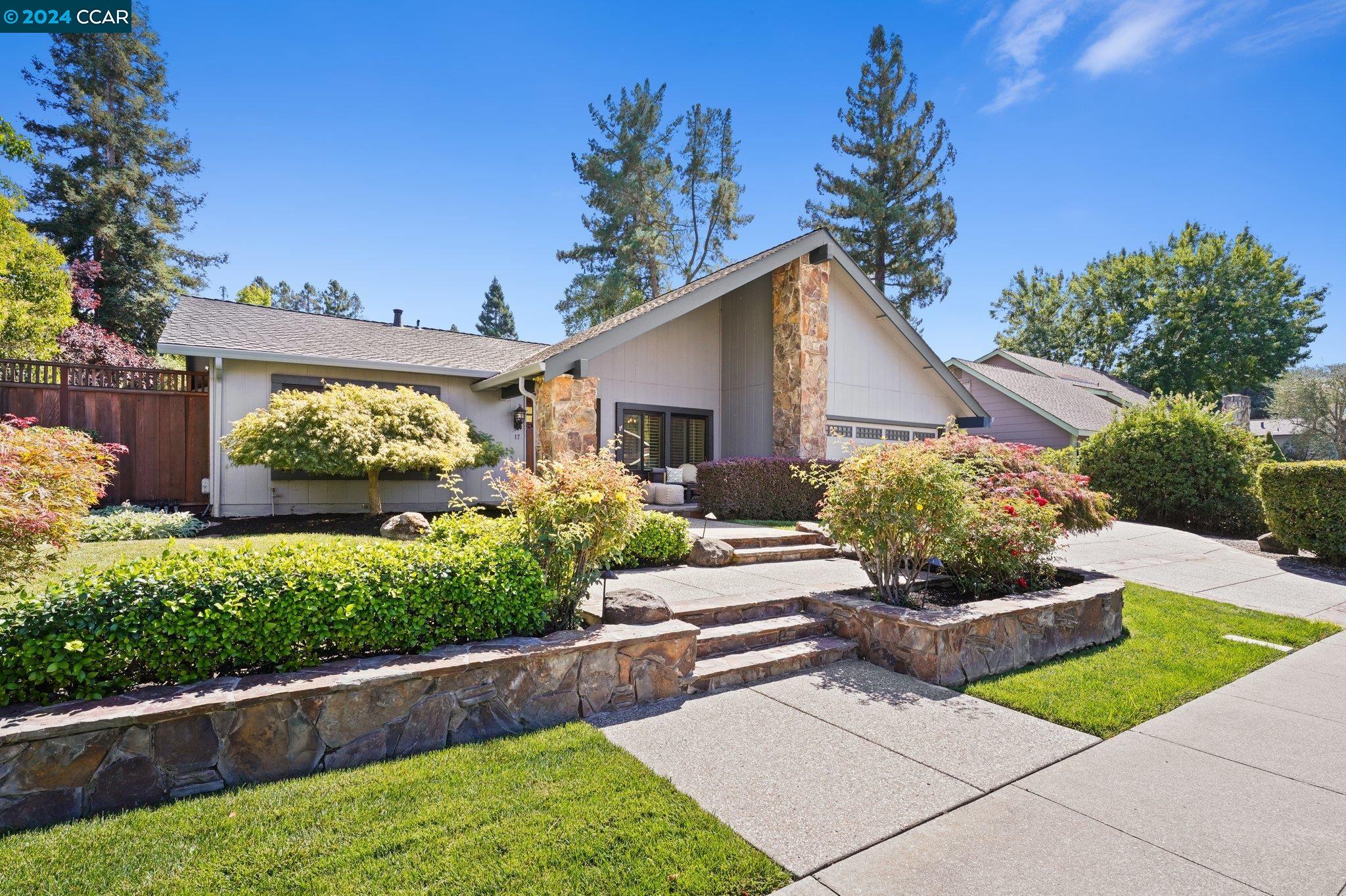 a house view with a garden space