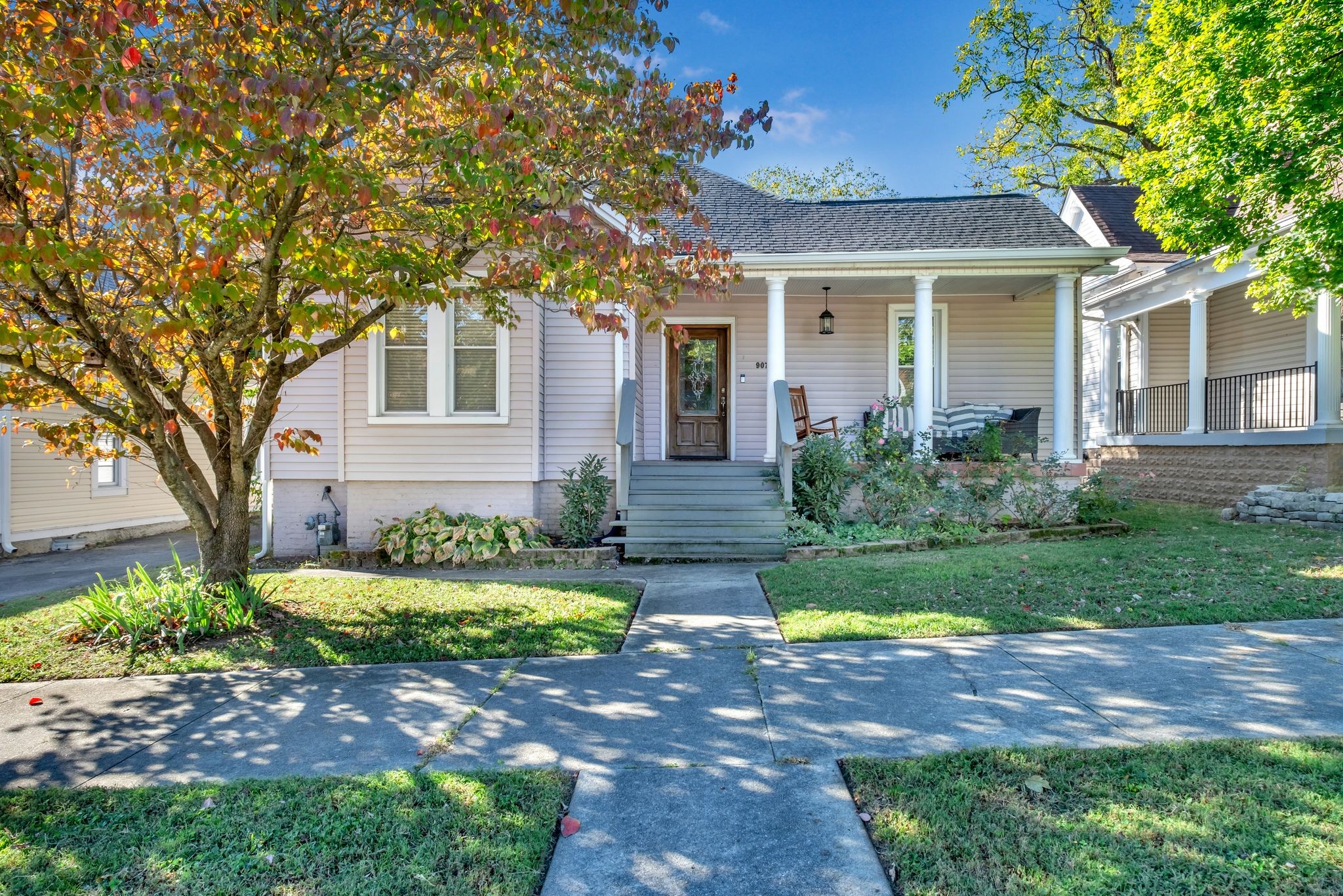 front view of a house with a yard