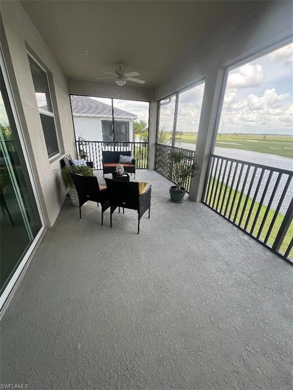 a view of a livingroom with furniture hardwood floor and furniture