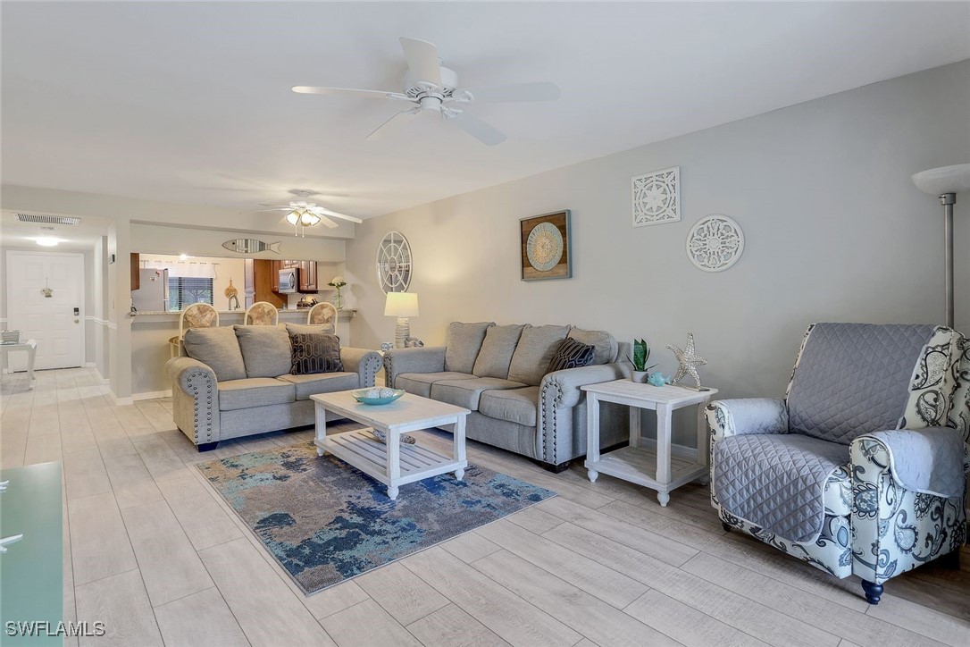 a living room with furniture and a couch