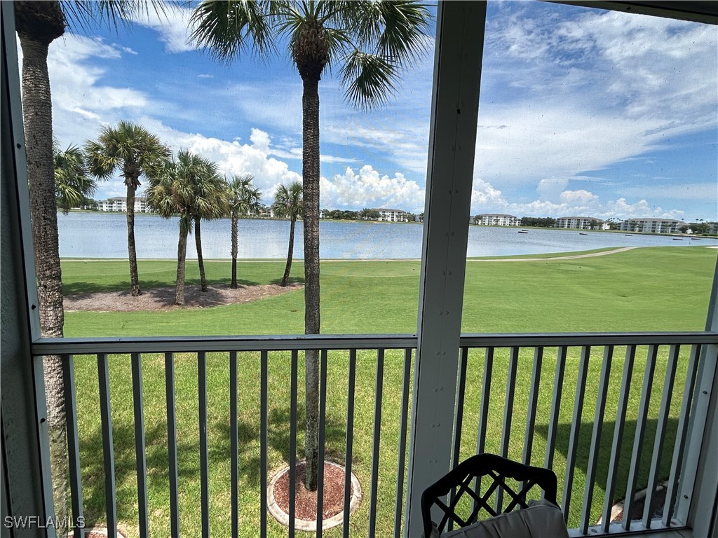 a view of a balcony with wooden floor