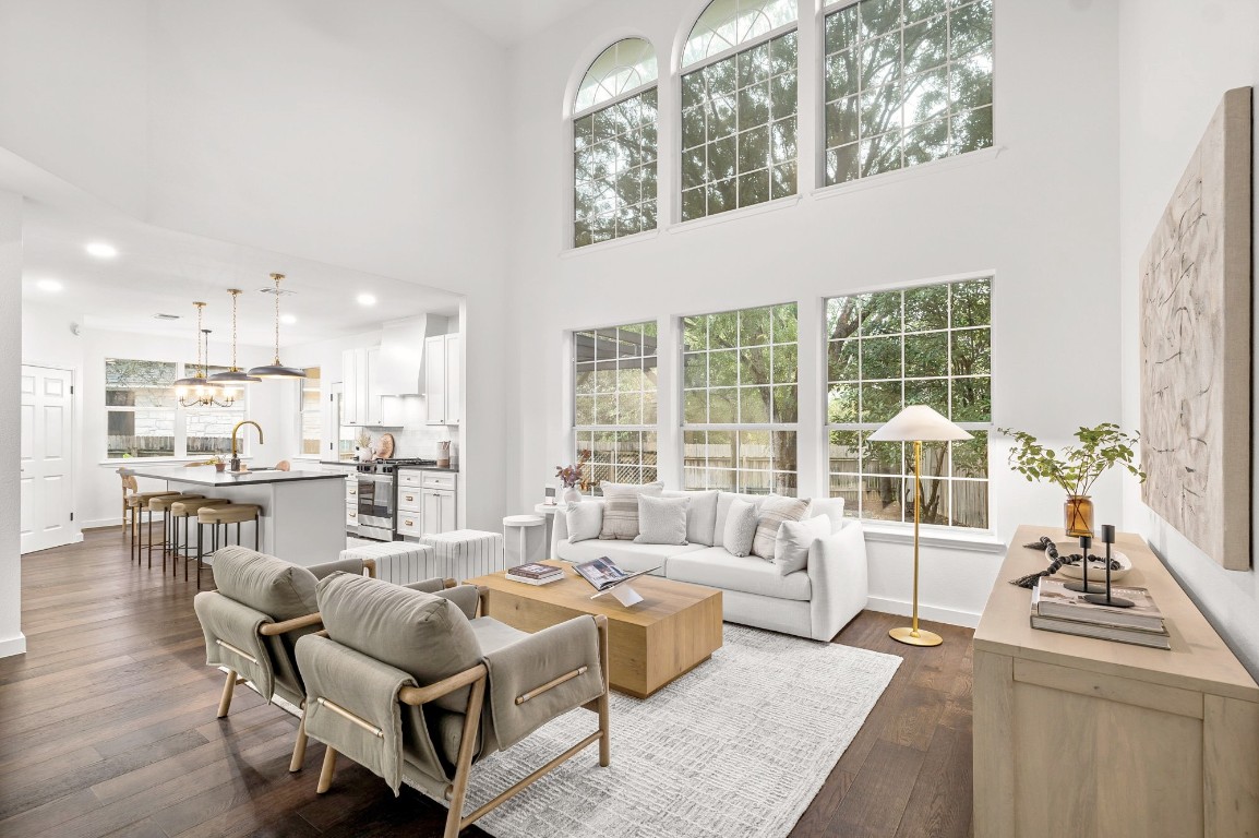 a living room with furniture and a table