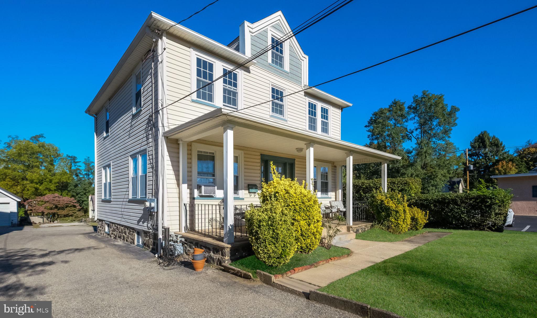 front view of house with a yard