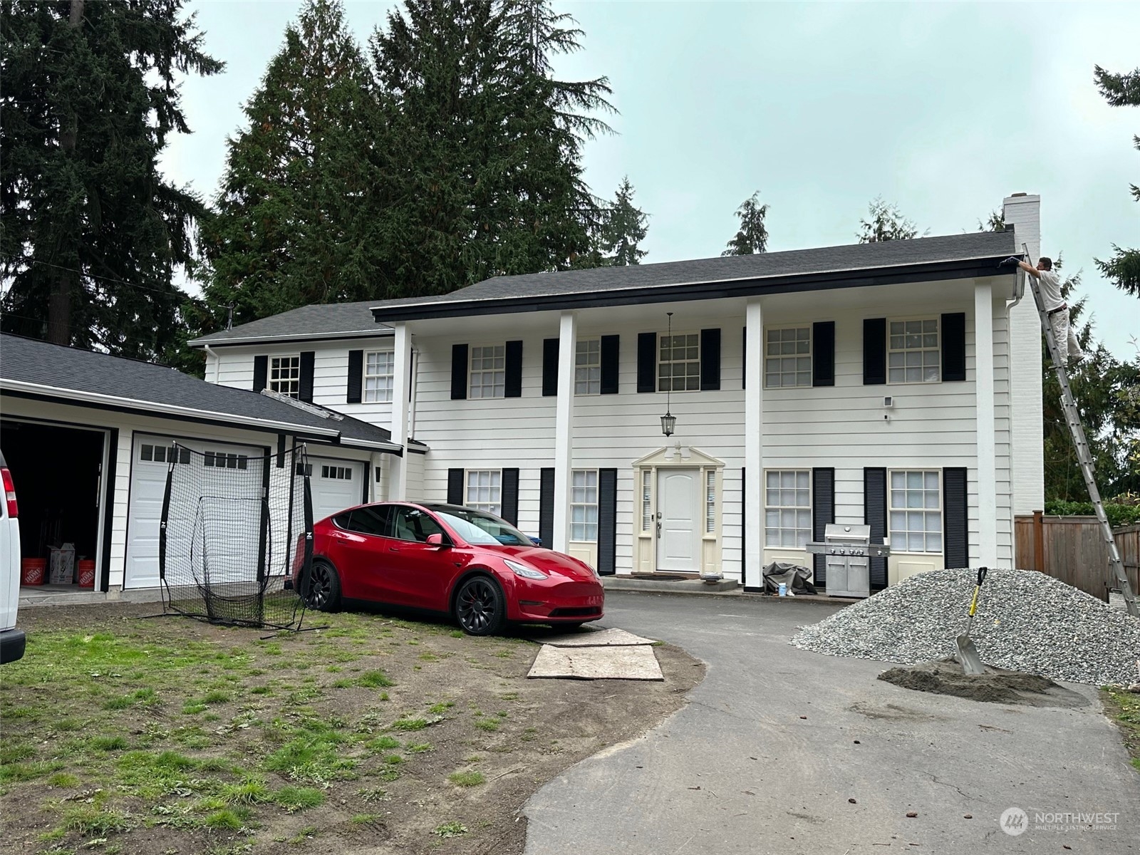 a car parked in front of a house