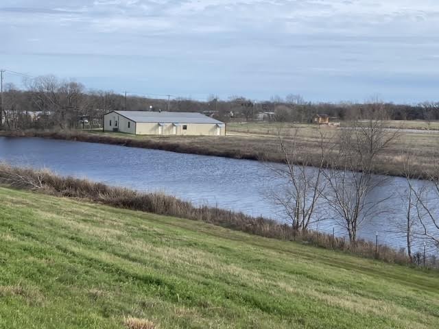 a view of a lake with outdoor space