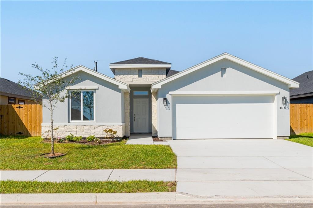 View of front of home with a 2 car garage