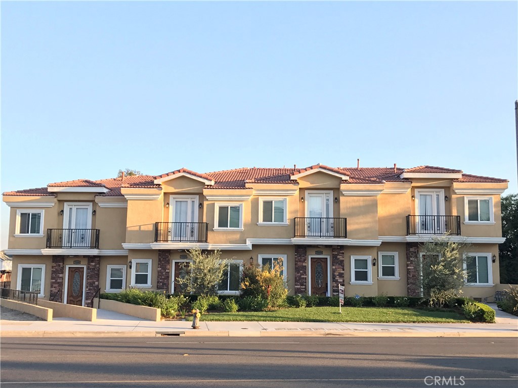 a front view of residential houses