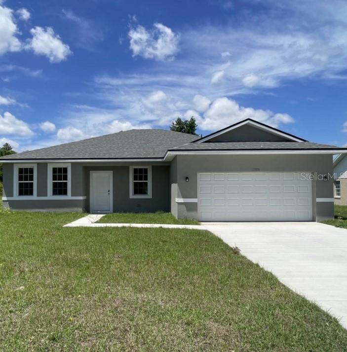 front view of a house with a yard