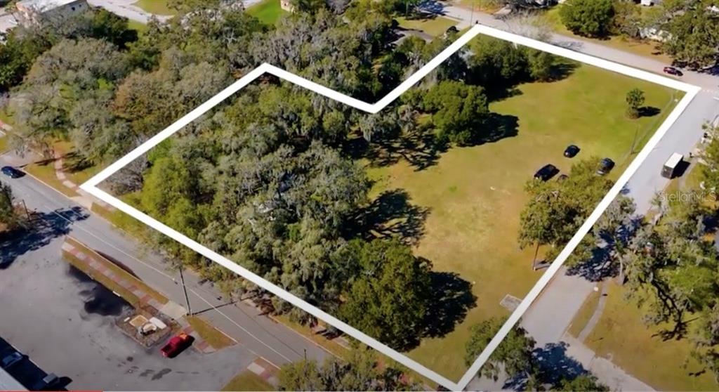 an aerial view of a house with a garden