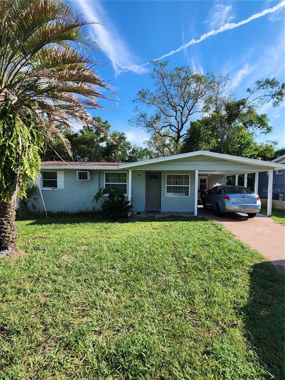 front view of a house with a yard