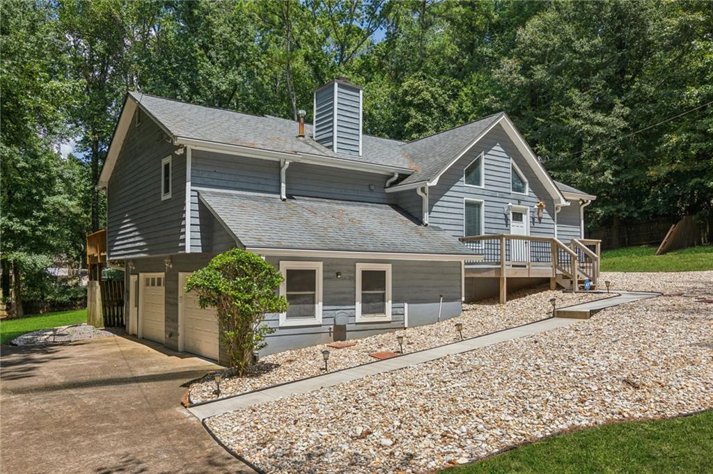 a house with trees in the background