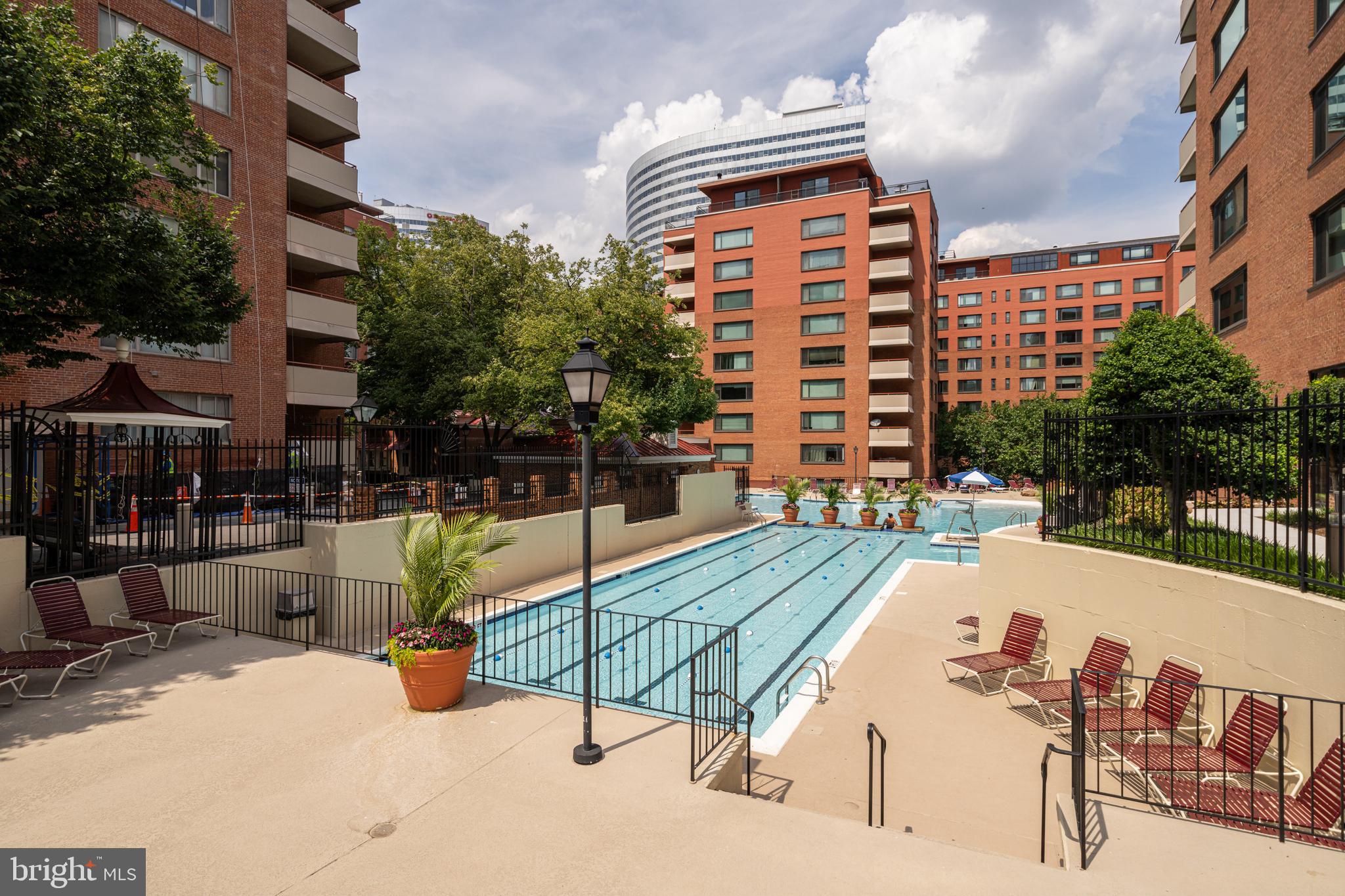 a view of a swimming pool with a lounge chairs