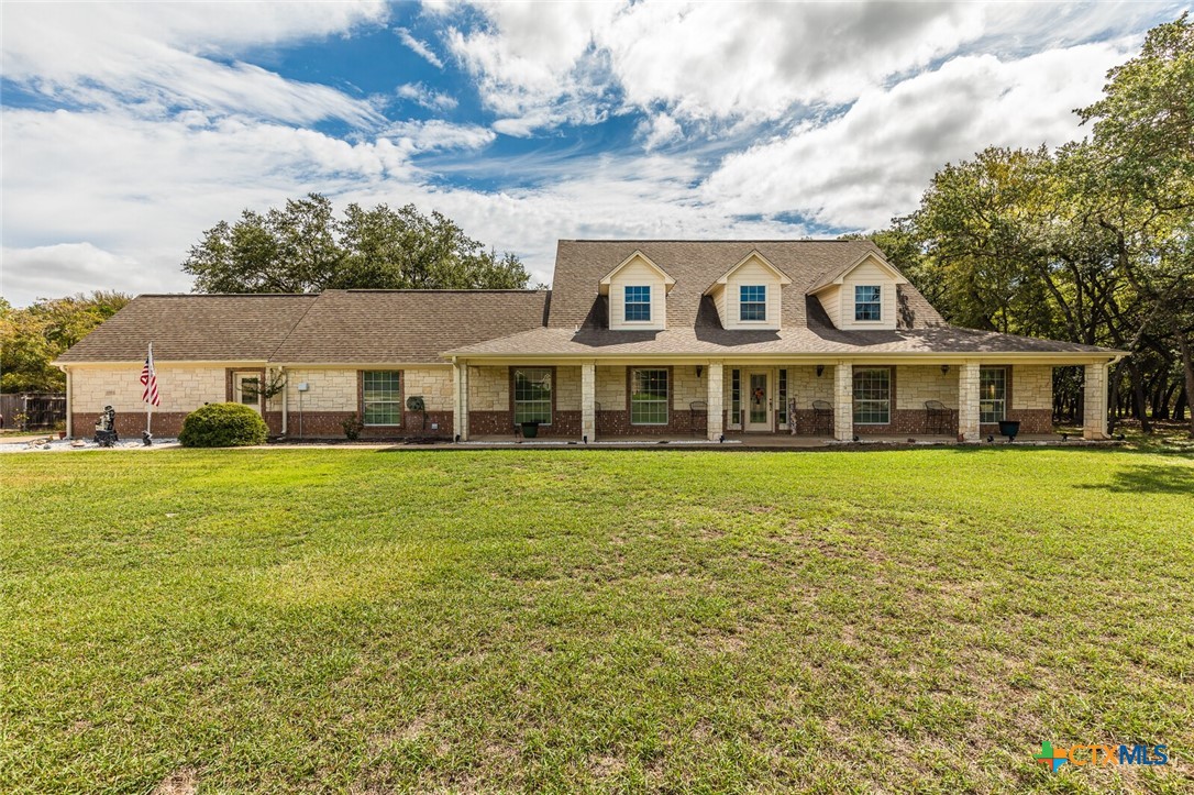 a front view of house with yard