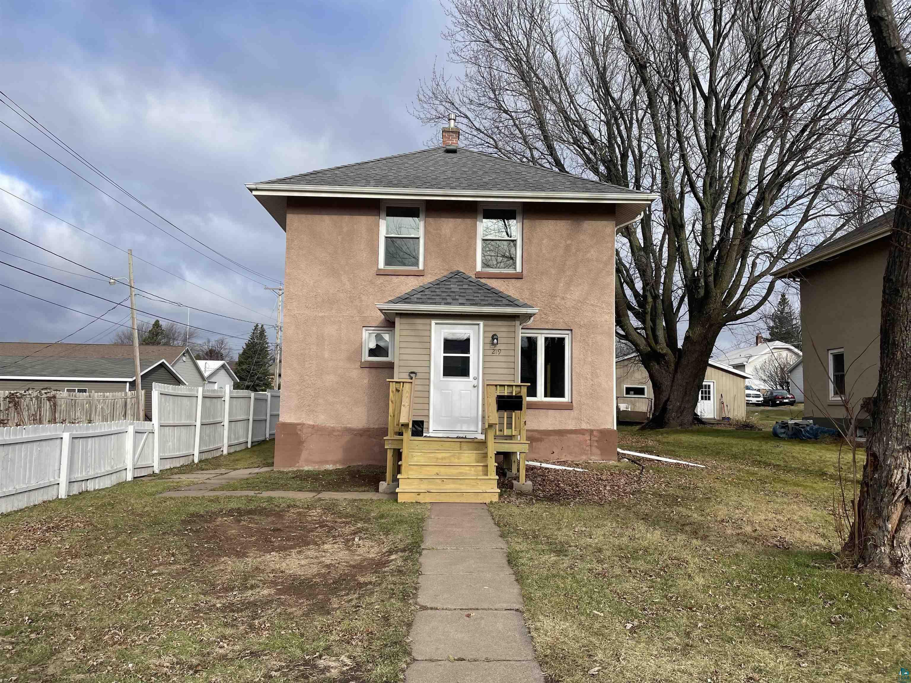 View of front of house with a front lawn