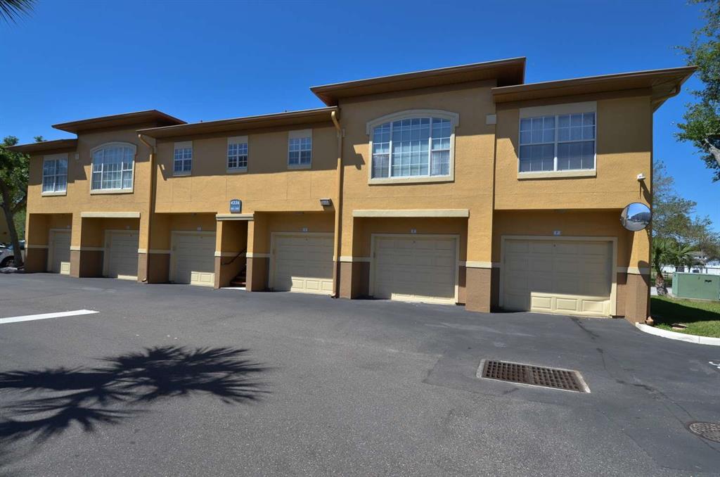 a front view of a house with a garage