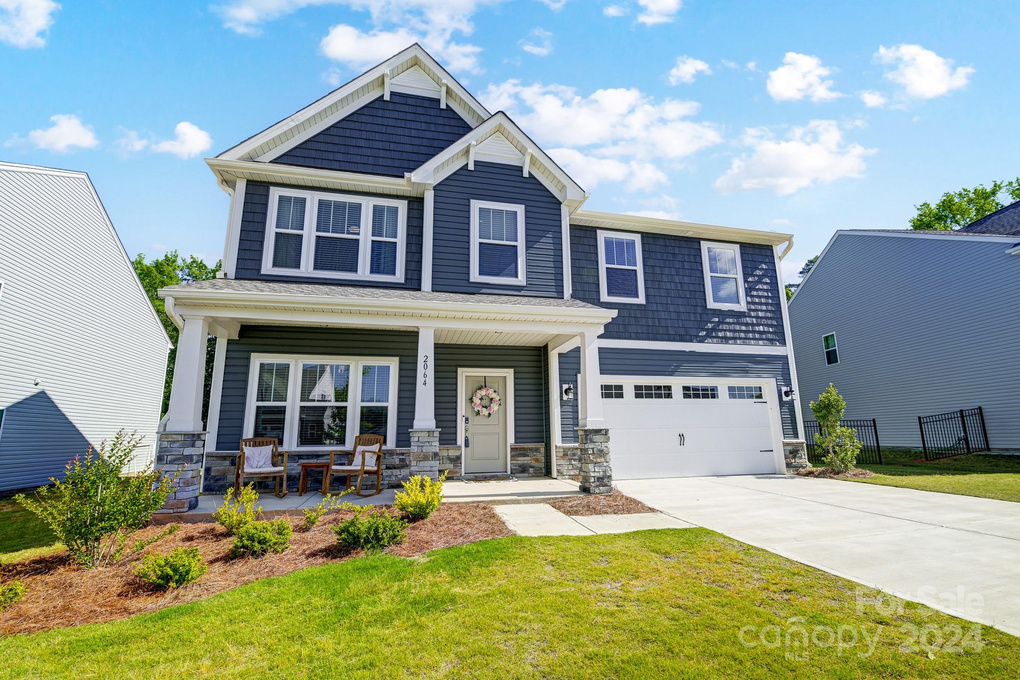 a house view with a garden space