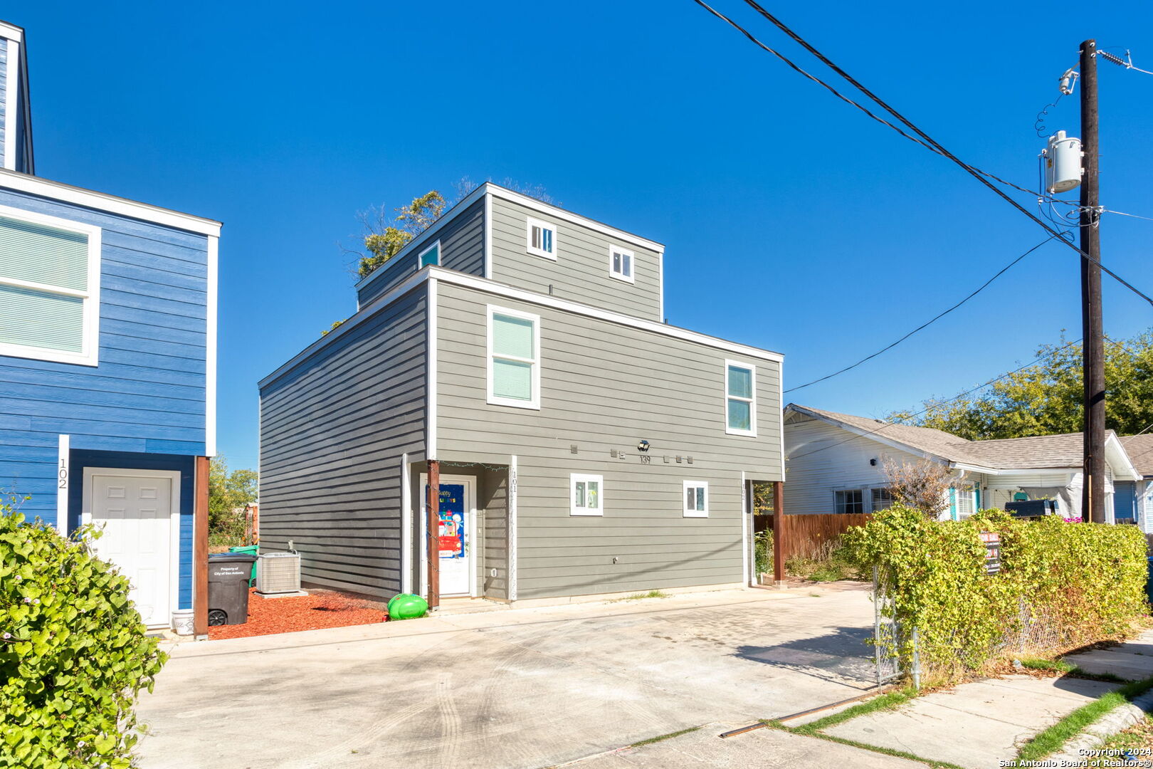 a front view of a house with a garage