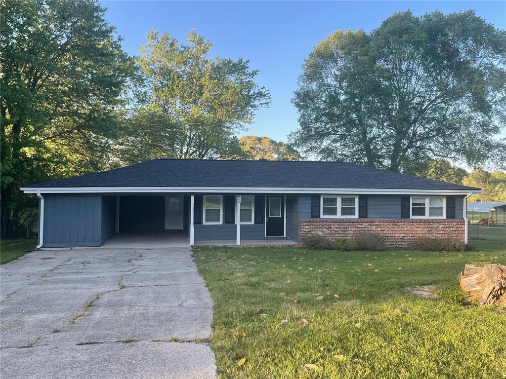 front view of a house with a yard