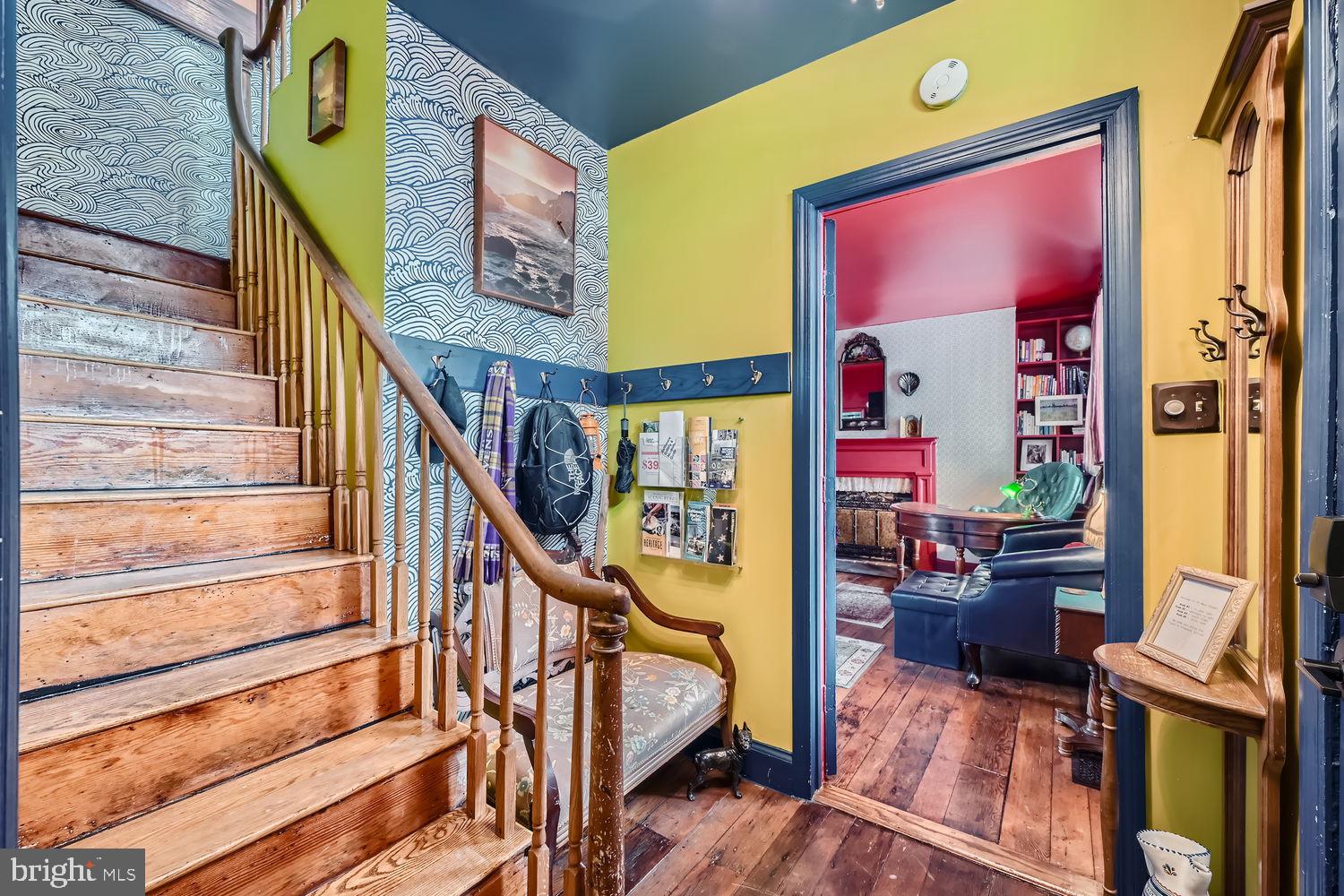 a view of a staircase and a living room