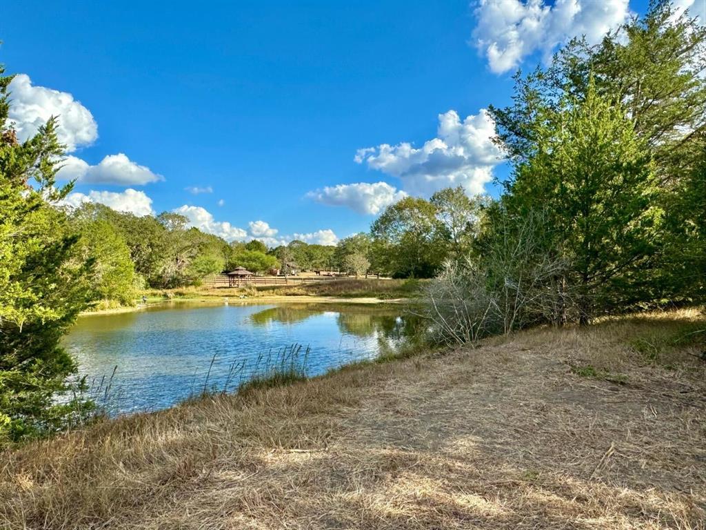 a view of a lake with outdoor space