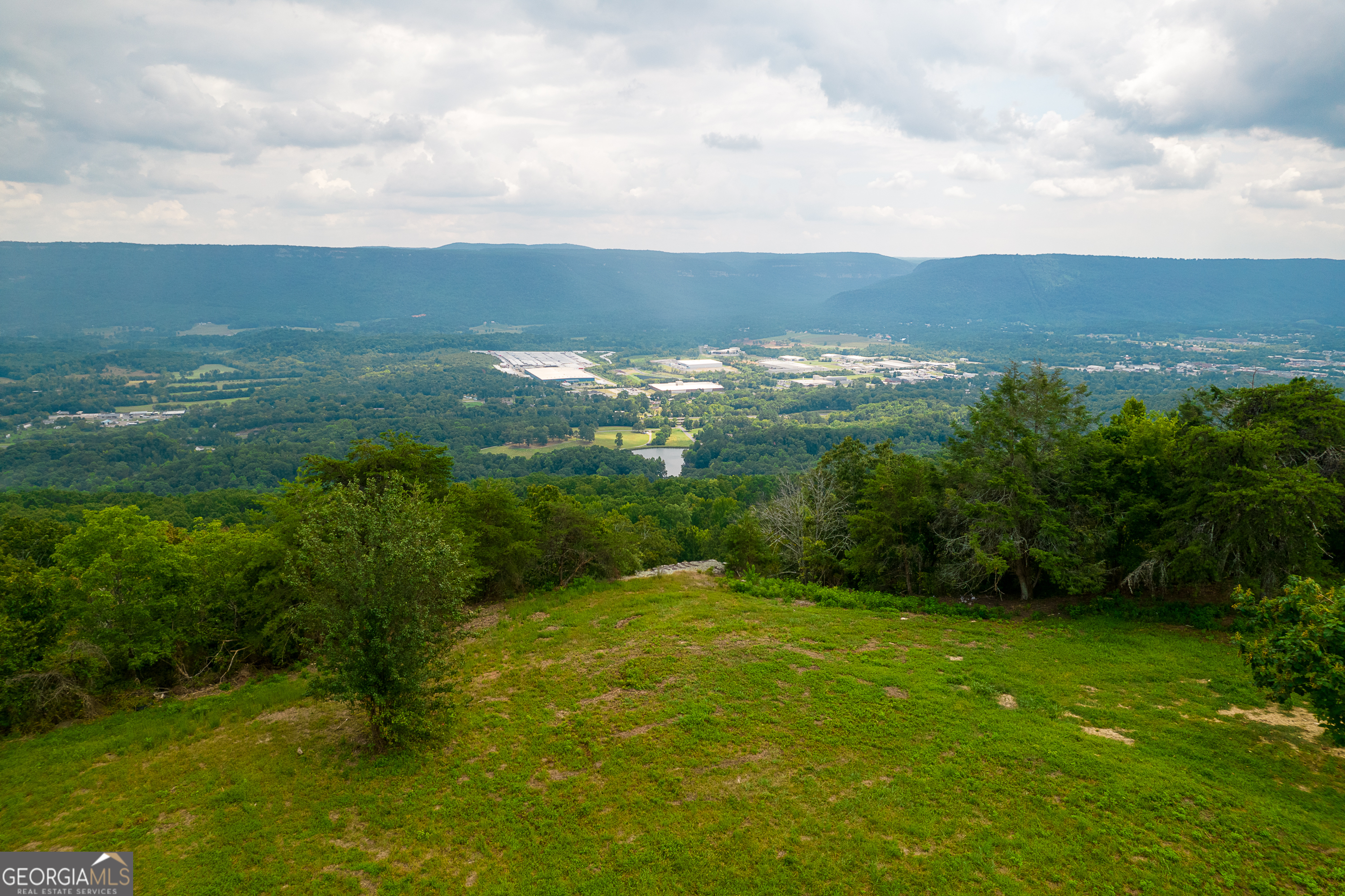 a view of lake with mountain