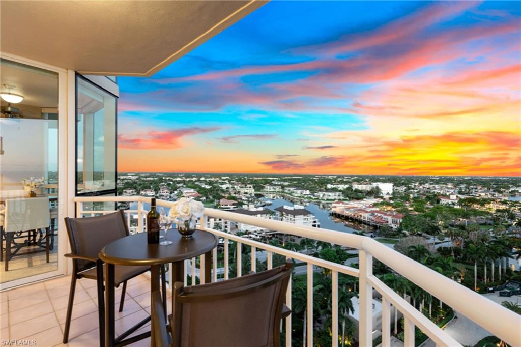 a view of a balcony with city view