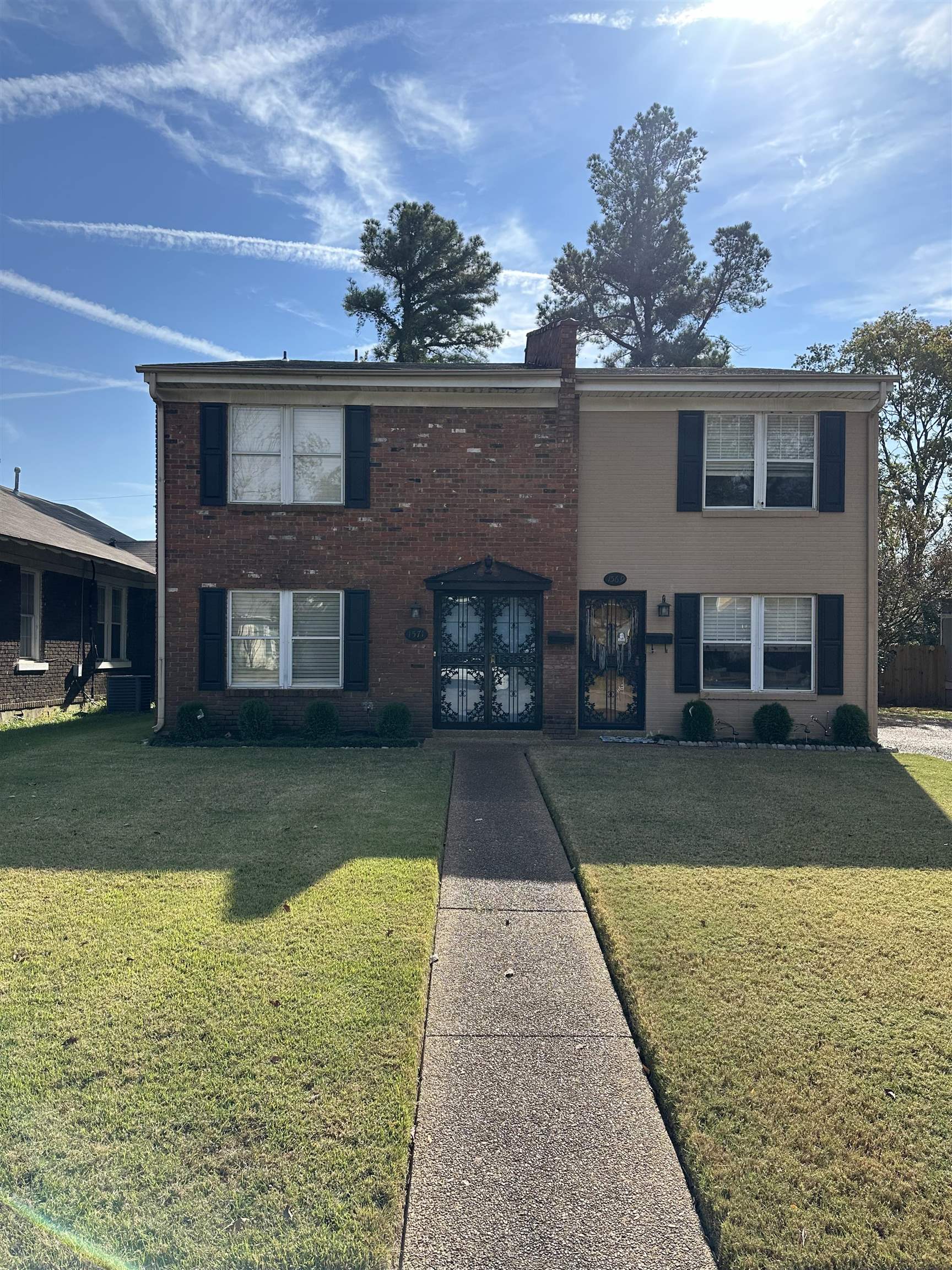 View of front of house with a front yard