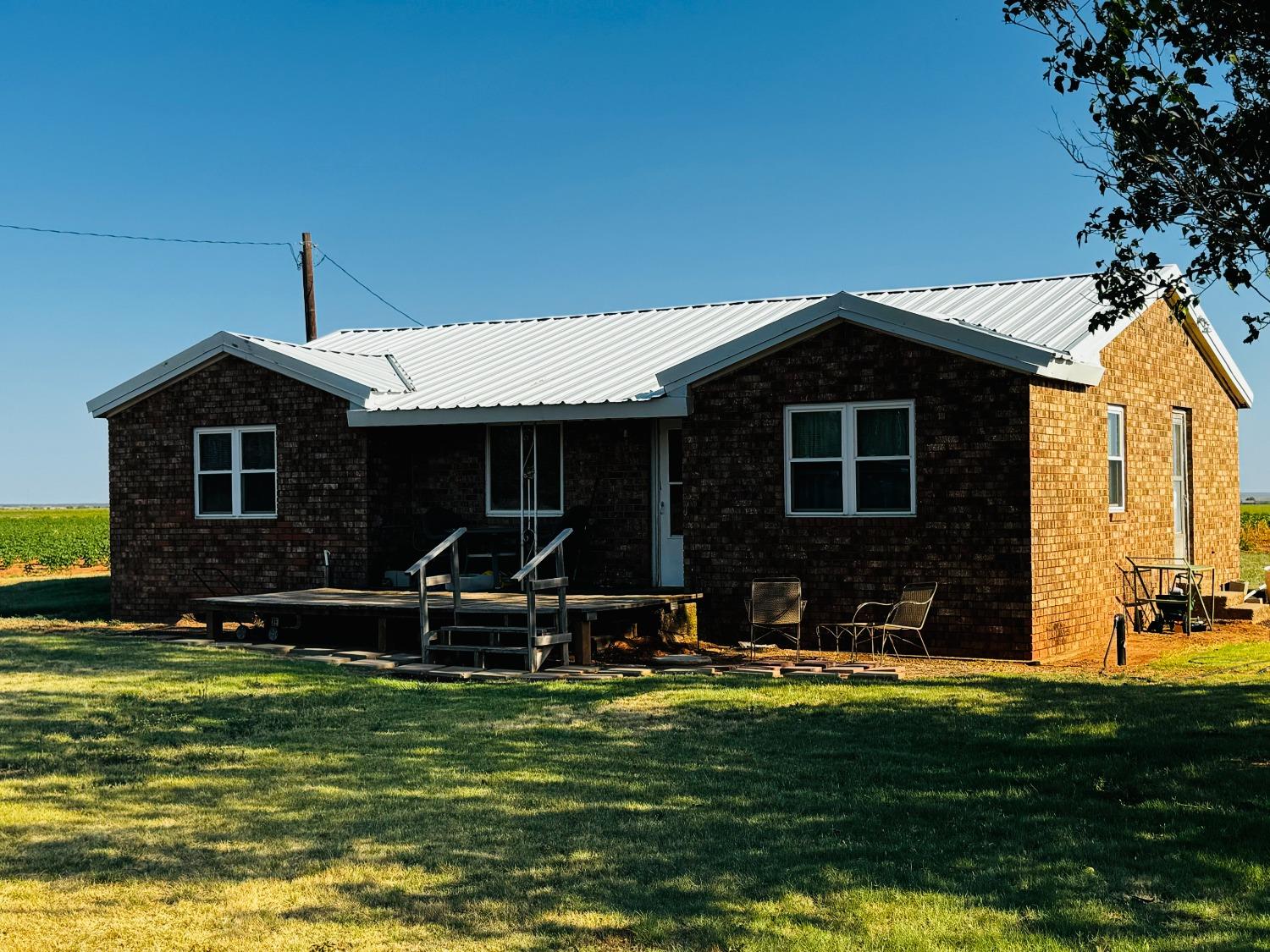 a front view of house with a yard