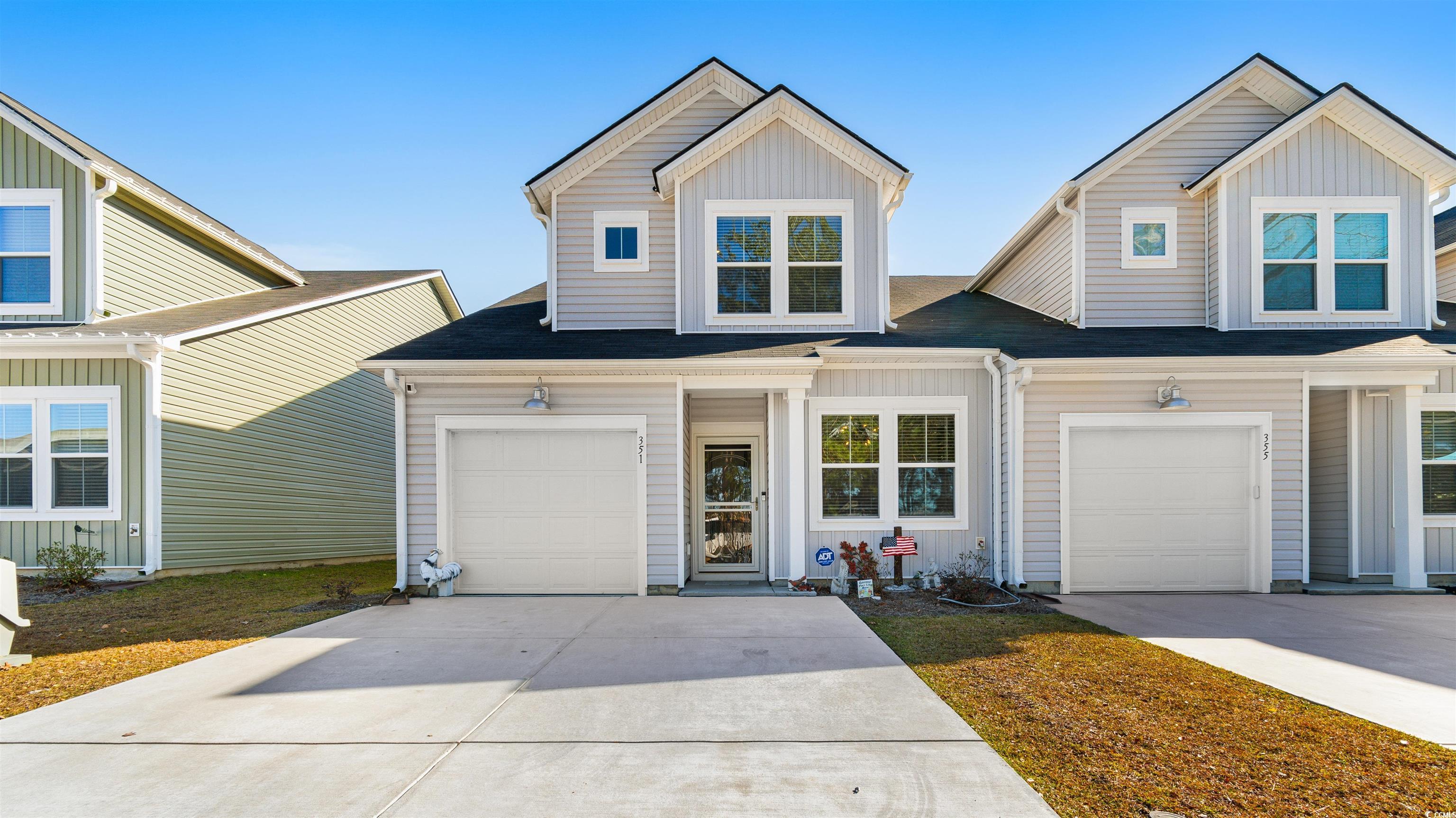 View of front of home with a garage