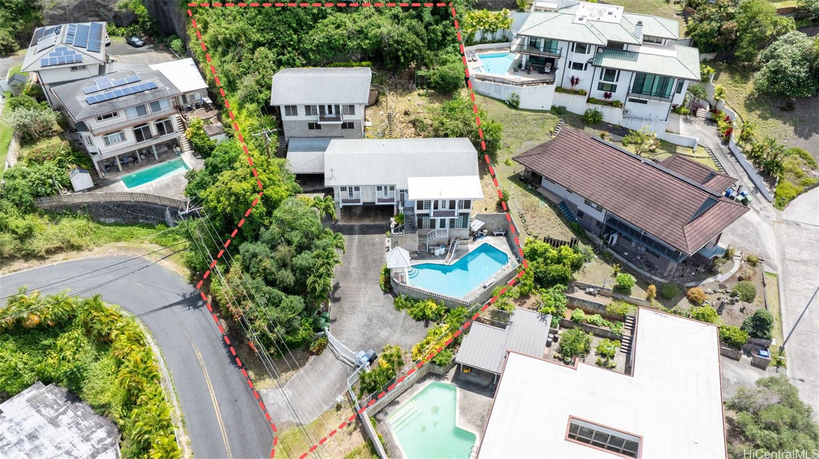 an aerial view of multiple houses with yard